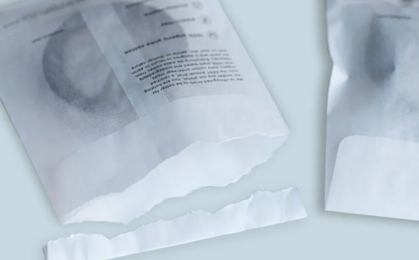 Metal parts in the glassine paper bags